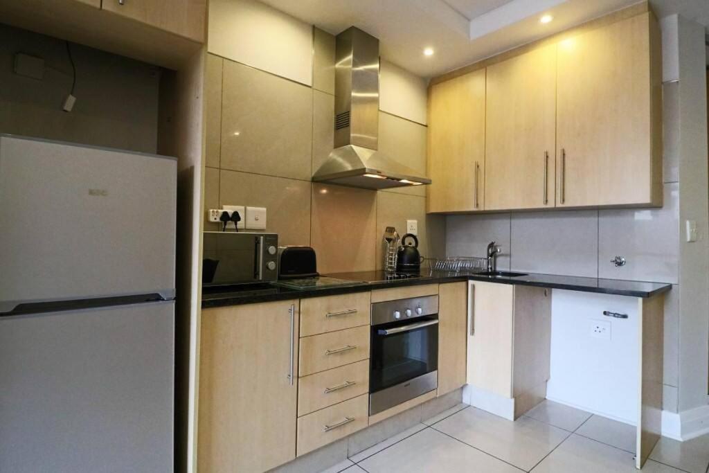 Upmarket Sandton Hydro Park Apartments Йоханнесбург Экстерьер фото